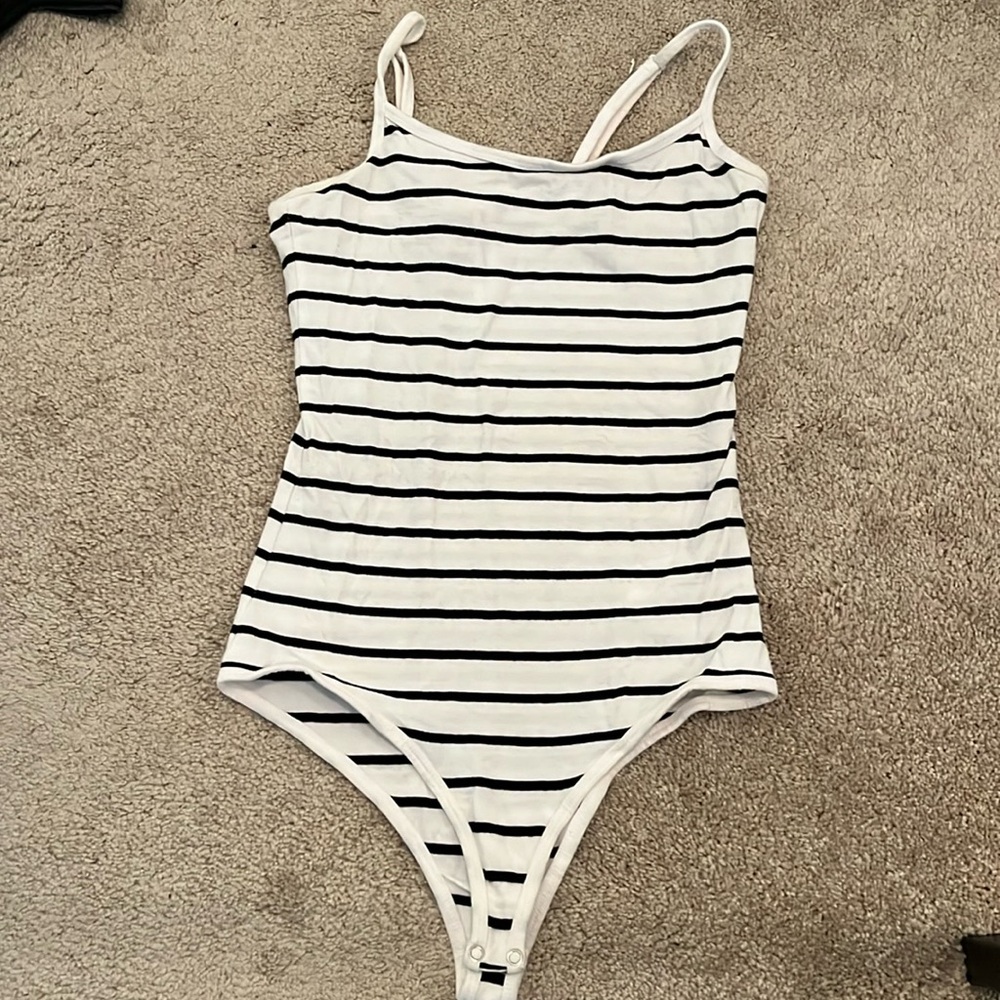 Stripped white and black body suit